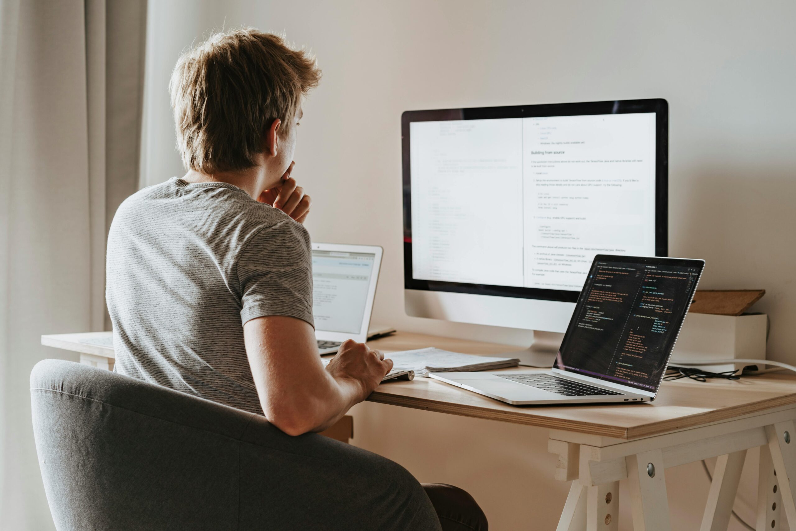 Sitting at Computer Desk - Modernizing Tech